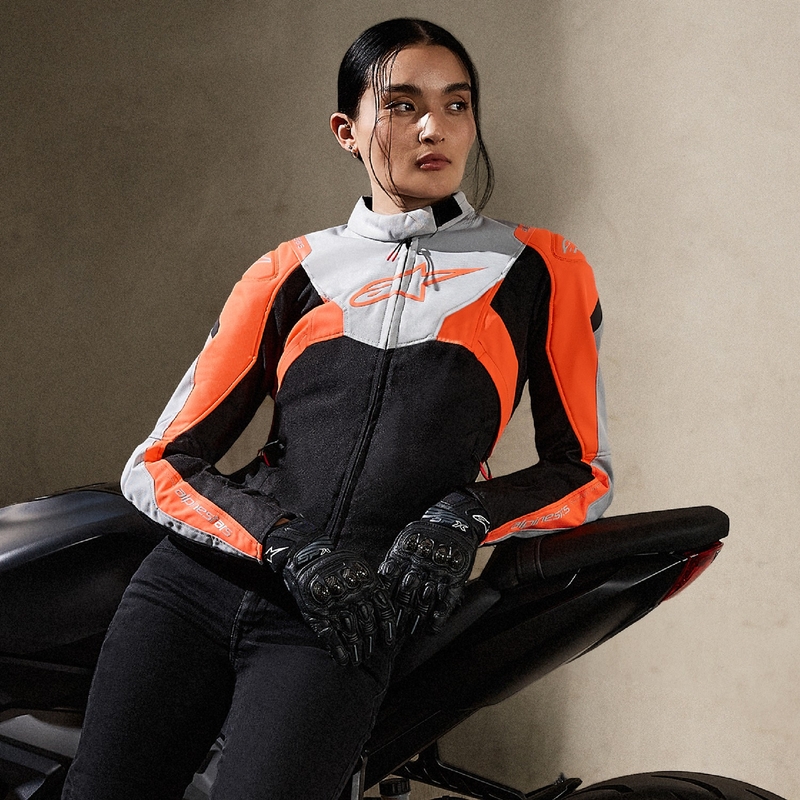 Alpinestars Stella T-Jaws 4 vandtæt sort-grå-fluerød motorcykeljakke til kvinder