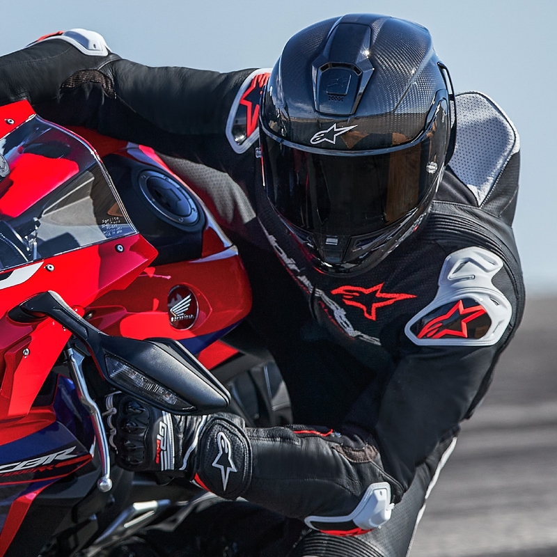 Alpinestars GP-R7 Tech-Air-klar/kompatibel sort-hvid-fluorrød motorcykeldragt i ét stykke læder